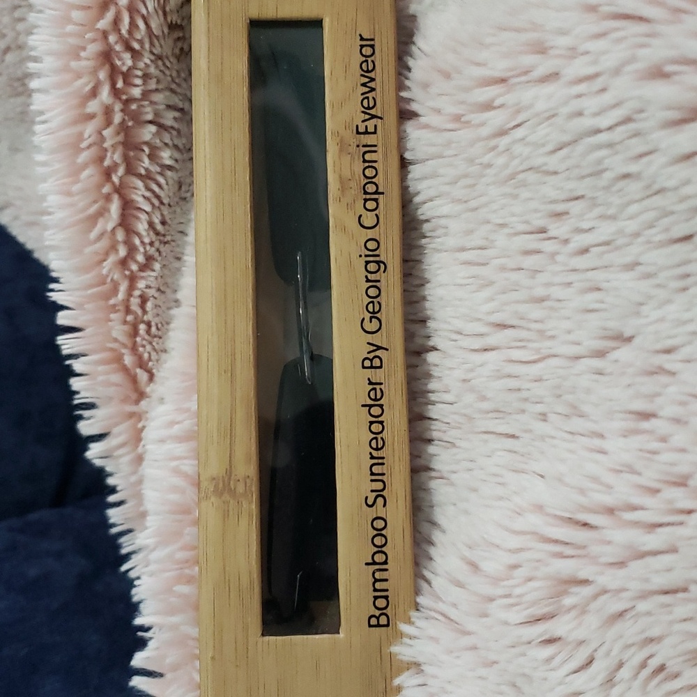 A pair of brand new Bamboo Sunreader by Georgio Caponi!